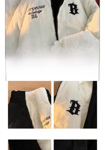 Detail of reversible winter jacket showing white fleece and black corduroy textures