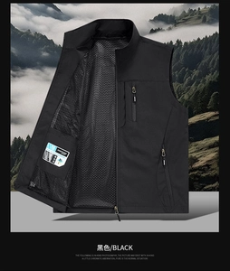 Detail of black fishing vest showing breathable honeycomb mesh lining and zipped pockets
