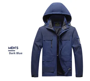 Detail of dark blue waterproof outdoor jacket with zipper pockets and breathable mesh lining