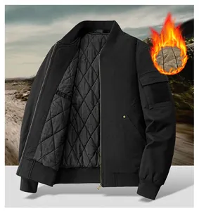 Detail of men's bomber jacket with thick quilted lining and ribbed knit cuffs
