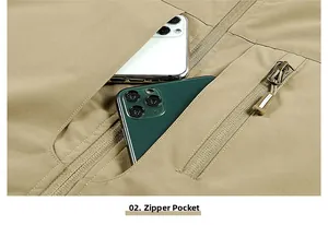 Detail of multi-pocket khaki vest showing large capacity zipper storage for mobile phones