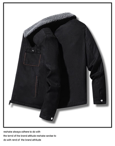 Detail of winter work jacket with grey fleece collar, contrast stitching, and chest pocket
