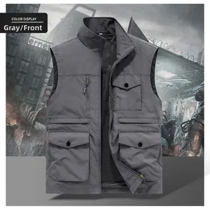 Detail of dark grey outdoor fishing vest with multiple pockets and breathable mesh lining