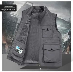 Close-up of gray multi-pocket fishing vest with mesh lining and utility flap pockets