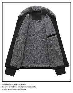 Detail of men's jacket showing thick grey fleece lining and inner size label