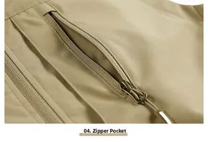 Detail shot of the khaki fishing vest featuring a durable zipper pocket and pull cord