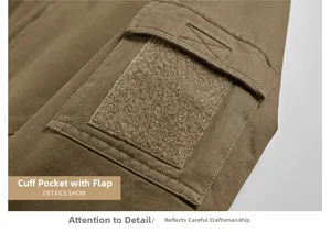 Close-up of tactical bomber jacket sleeve featuring a utility flap pocket and velcro patch