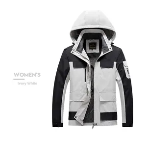 Detail of ivory and black waterproof outdoor hooded jacket with multi-pocket design