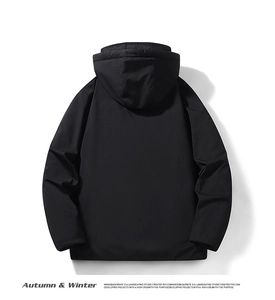 Detailed back view of a black hooded winter jacket with windproof fabric and loose cut