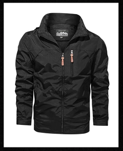Detail of black outdoor jacket featuring a stand collar and vertical zip chest pocket