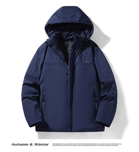 Detail view of water-resistant navy men jacket with hood and warm inner lattice lining