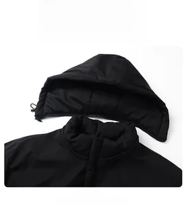 Detail view of the detachable hood on a black waterproof windproof jacket for men