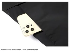 Detail of winter jacket showing invisible zipper pocket with smartphone for storage