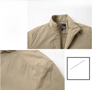 Detail display of standing collar and fleece lining on khaki outdoor sports jacket