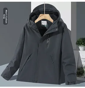 Détail de la veste chauffante gris anthracite avec poches zippées et poignets velcro