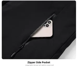 Detail of waterproof zipper side pocket on men black winter jacket with phone inside