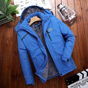 Men's blue waterproof outdoor hiking jacket with warm grey fleece lining and hood