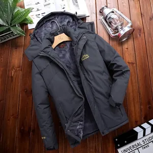 Men's dark grey hooded outdoor jacket with fleece lining on rustic wood background