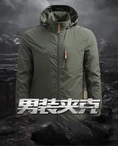 Detail of army green outdoor jacket with zipper pocket and outdoor logo on the chest