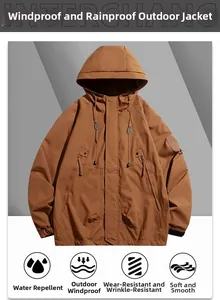 Detail of waterproof brown hooded windbreaker showing side zipper pocket and texture