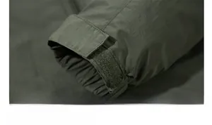 Detail view of the olive green outdoor jacket with adjustable velcro windproof cuffs