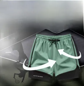 Detail of double-layer green athletic shorts with quick-dry eco-friendly yarn fabric