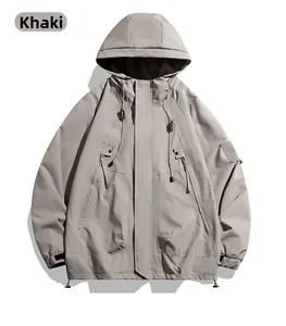 Detail view of khaki hooded jacket with functional chest zipper and velcro sleeve cuffs