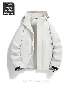 Detail of ivory windproof outdoor jacket featuring adjustable velcro cuffs and dual closure