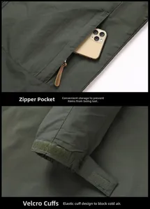 Detail of army green jacket featuring outdoor zipper pocket and velcro windproof cuffs