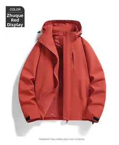 Macro detail of red outdoor jacket showing windproof zipper and adjustable velcro cuffs