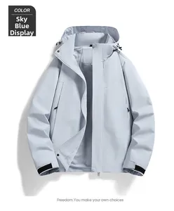 Detail view of sky blue windbreaker with mesh lining and adjustable velcro cuffs