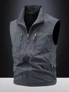Gilet fonctionnel homme gris foncé avec poches multiples en tissu léger à séchage rapide
