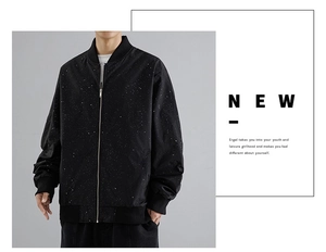 Detail of baseball collar jacket featuring unique white ink splatter star pattern texture