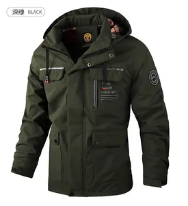 Detail view of dark green outdoor jacket featuring hood and reflective chest pocket strips