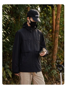 Outdoor close-up of a black hooded windproof jacket with multi-pocket and Colorado hat