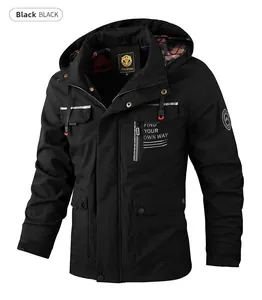 Close-up of black outdoor jacket with functional chest pockets and reflective strip detail