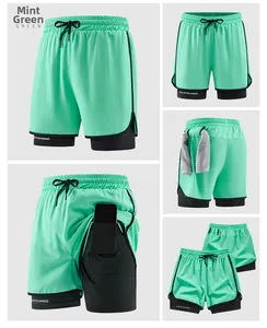 Detail view of fruit green 2-in-1 sports shorts featuring phone pocket and towel loop