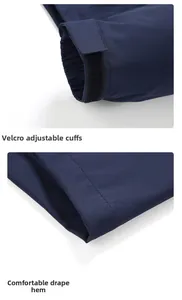 Detail of adjustable velcro elastic cuffs and smooth hemline on dark blue jacket