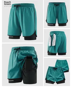 Detailed view of peacock green athletic shorts featuring a phone pocket and towel loop