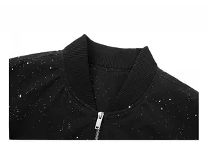 Detail of black baseball collar jacket with star print, ribbed neck and metal zipper