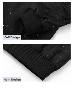 Detail of black baseball jacket ribbed cuffs and hem with white starry print patterns