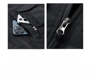 Dettaglio della tasca multifunzione e cerniera metallica del gilet tecnico outdoor