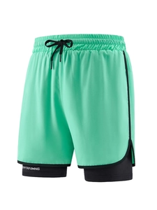 Men's two-in-one mint green running shorts with black compression liner and drawstring