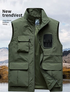 Detail of army green outdoor utility vest with multiple pockets and breathable mesh lining