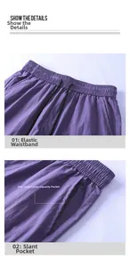Detail of purple quick-dry shorts featuring an elastic drawstring waistband and side pockets