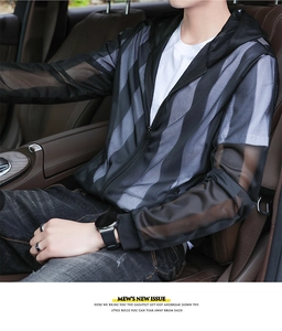 Detail view of breathable mesh texture on men's striped sun protection hoodie jacket