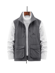 Men's dark gray outdoor utility vest with fleece lining and multiple pockets