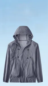 Detail of lightweight gray sun protection jacket with UPF50+ and zippered side pockets