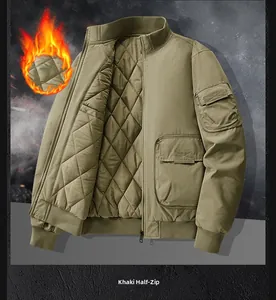 Detail of khaki jacket showing diamond quilted lining and utility sleeve pocket