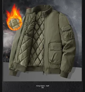 Detail of military green bomber jacket with diamond quilted lining and utility arm pocket